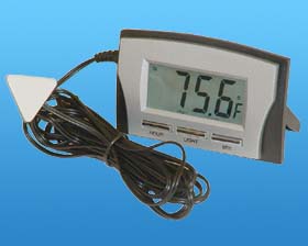 PORTABLE LCD CLOCK/THERMOMETER